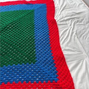 Colorful Crochet lap Blanket. 43x43”. Never used/well stored. Smoke free